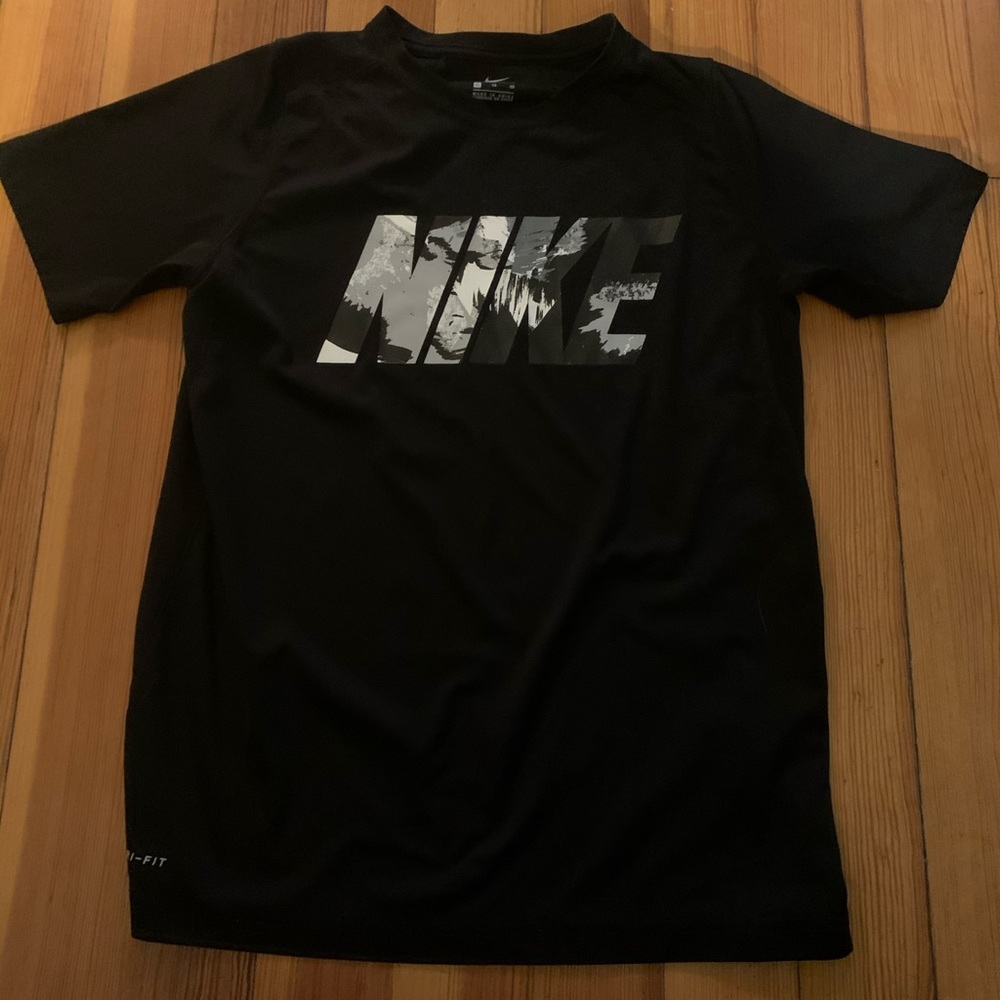 It’s a Black Dri-Fit shirt